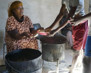 Annette serving the food