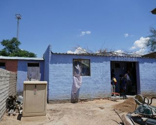 Soup kitchen building in Annette's garden